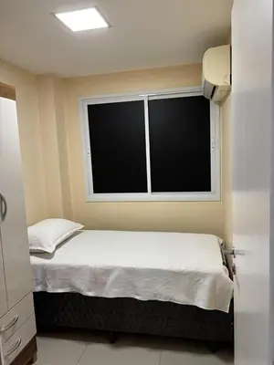 Uma cama ou camas num quarto em Helbor My Way Abolição