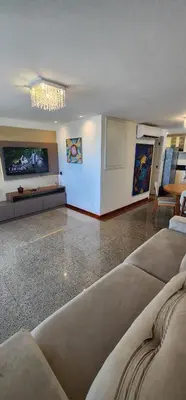 Uma área de estar em Beira Mar Scala by DS Imóveis