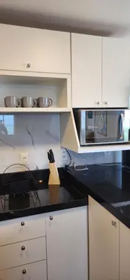 A cozinha ou kitchenette de Beira Mar Scala by DS Imóveis