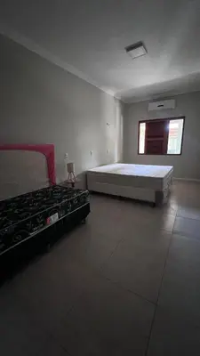 Uma cama ou camas num quarto em Villa Familia Preá