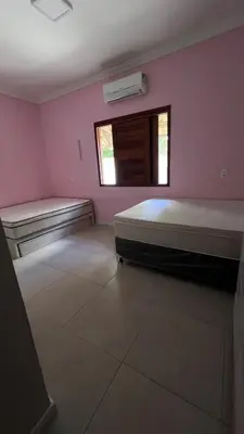 Uma cama ou camas num quarto em Villa Familia Preá
