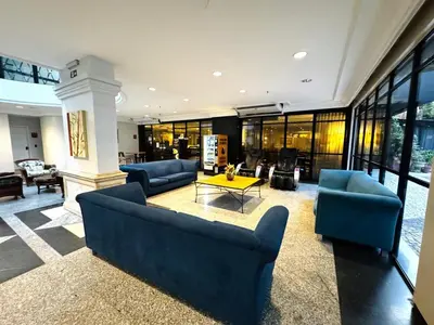 Uma área de estar em Apartamento na Beira Mar - Fortaleza