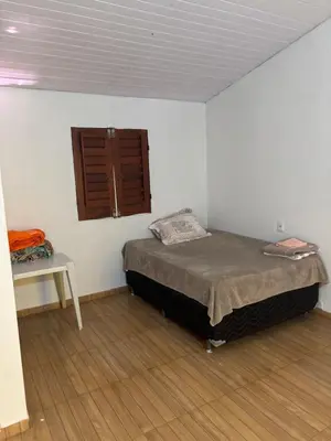 Uma cama ou camas num quarto em Pousada Raios do Sol
