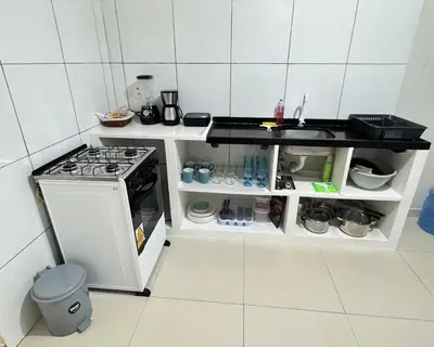 A cozinha ou kitchenette de Casa no 1º piso com 2 Suítes a 200mts da praia