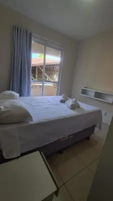 Uma cama ou camas num quarto em Refúgio na praia - Cumbuco Residence