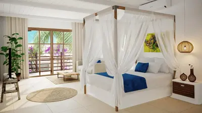 Uma cama ou camas num quarto em Luxury Resort e Hotel Ltda