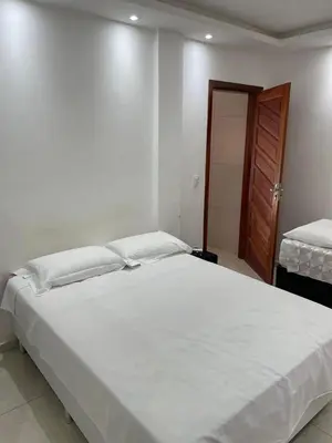 Uma cama ou camas num quarto em Flat Davitoria Flecheiras