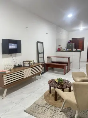 Uma televisão e/ou sistema de entretenimento em Casa Paracuru