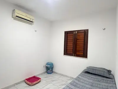 Uma cama ou camas num quarto em Casa Paracuru