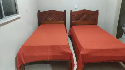 Uma cama ou camas num quarto em Rancho dos Bicos