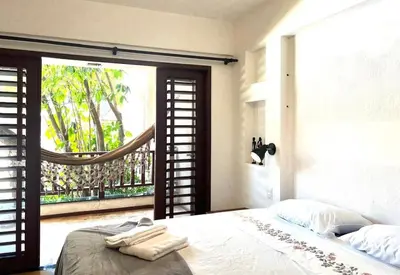 Uma cama ou camas num quarto em Seu cantinho na Praia do Cumbuco