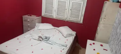 Uma cama ou camas num quarto em Ambiente agradável