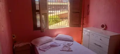 Uma cama ou camas num quarto em Ambiente agradável