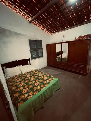 Uma cama ou camas num quarto em Casa brisa do mar icapuí