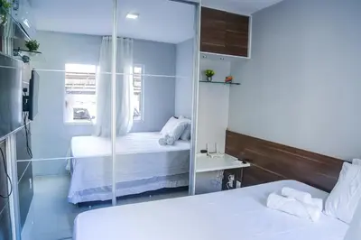 Uma cama ou camas num quarto em Apartamento aconchegante em Caucaia próximo a praia do Cumbuco