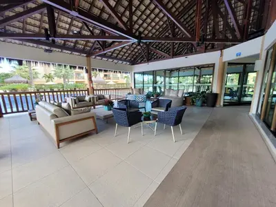 Uma área de estar em VG SUN Cumbuco - Apartamento pé na areia