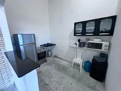A cozinha ou kitchenette de Pousada Buson Beach