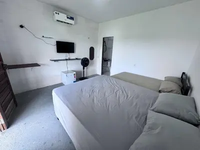 Uma cama ou camas num quarto em Pousada Buson Beach