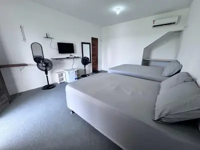 Uma cama ou camas num quarto em Pousada Buson Beach