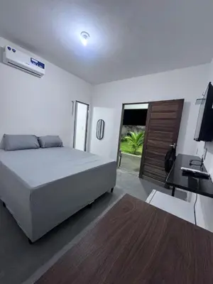 Uma cama ou camas num quarto em Pousada Buson Beach