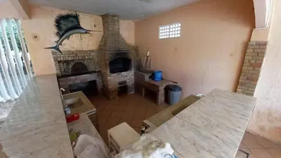 Uma área de estar em Casa Mar & Sossego