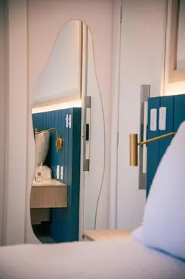 Uma cama ou camas num quarto em Vibes Beach House
