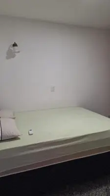 Uma cama ou camas num quarto em Flat atlantico 1404