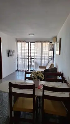 Uma área de estar em Flat atlantico 1404