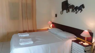 Uma cama ou camas num quarto em Chales lua mar e sol