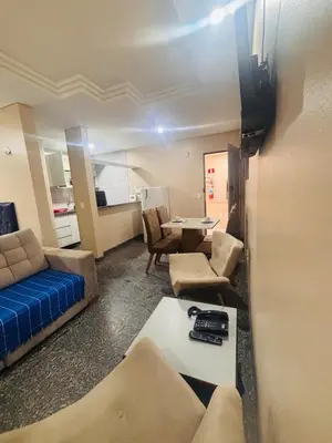 Uma área de estar em Flat Meireles luzon 303