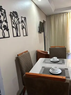Uma área de estar em Flat Meireles luzon 303