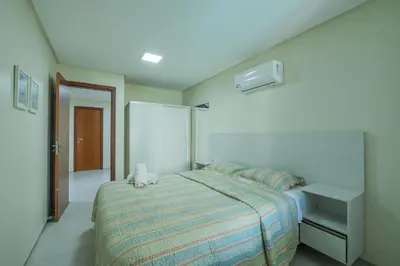 Uma cama ou camas num quarto em Scopa Beach #C3-200 - Pé na areia By Carpediem