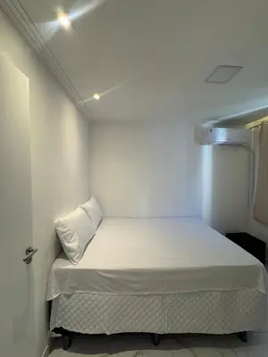 Uma cama ou camas num quarto em Apartamento Pé na areia Praia do futuro