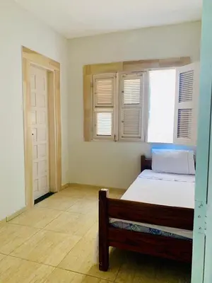 Uma cama ou camas num quarto em Casa na Prainha a 200 metros da praia