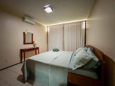 Uma cama ou camas num quarto em Casa Paraíso do Cumbuco- 5 Quartos AC- Piscina Privativa- 50m do Mar