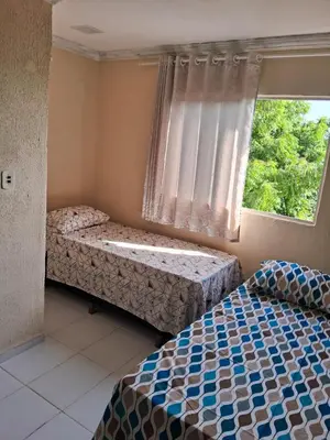 Uma cama ou camas num quarto em Casa blue