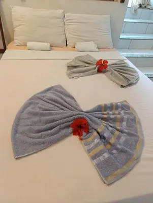 Uma cama ou camas num quarto em Hospedagem Terral Beach Canoa Quebrada