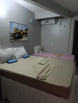 Uma cama ou camas num quarto em Hospedagem Terral Beach Canoa Quebrada