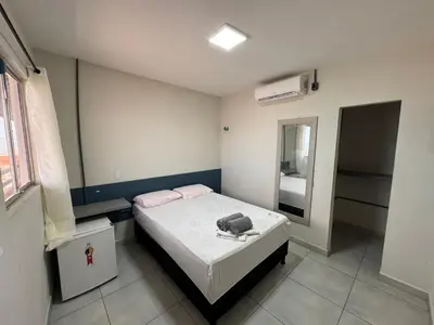 Uma cama ou camas num quarto em Pousada beira mar e sol