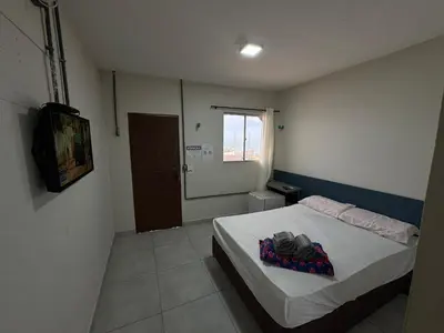 Uma cama ou camas num quarto em Pousada beira mar e sol