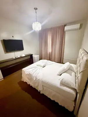 Uma cama ou camas num quarto em Raridade Apê 4 Quartos|Meireles|Beira Mar|180m2