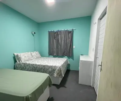 Uma cama ou camas num quarto em Casa 212