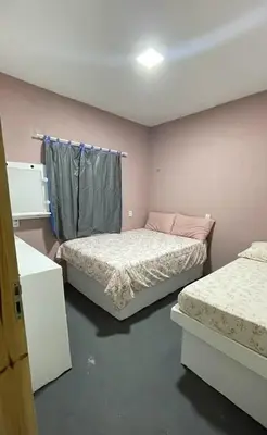 Uma cama ou camas num quarto em Casa 212