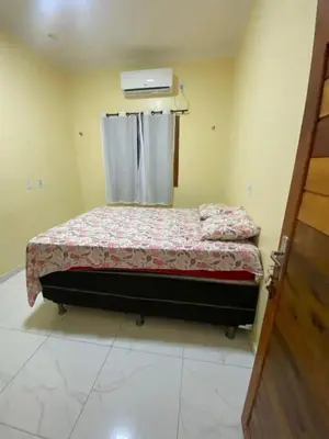 Uma cama ou camas num quarto em Casa aconchego Prea