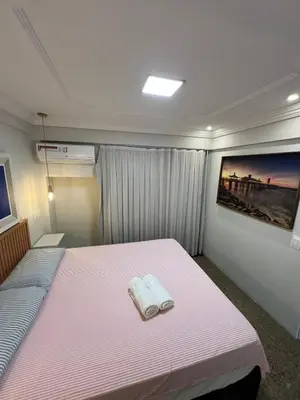 Uma cama ou camas num quarto em Scala by DS imoveis