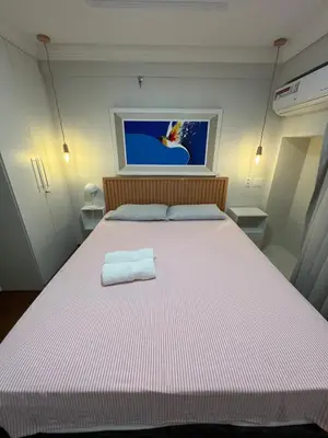 Uma cama ou camas num quarto em Scala by DS imoveis