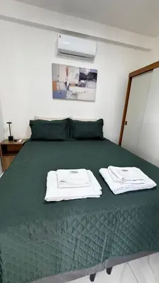 Uma cama ou camas num quarto em Conforto, lazer e otima localização - Beach Park