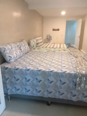 Uma cama ou camas num quarto em Sítio Chalé Primavera