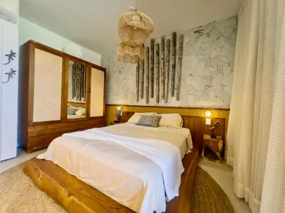 Uma cama ou camas num quarto em Casa Saya Buthu Ini