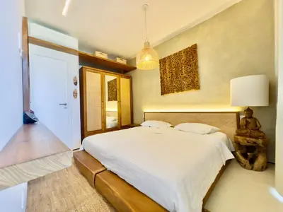 Uma cama ou camas num quarto em Casa Saya Buthu Ini